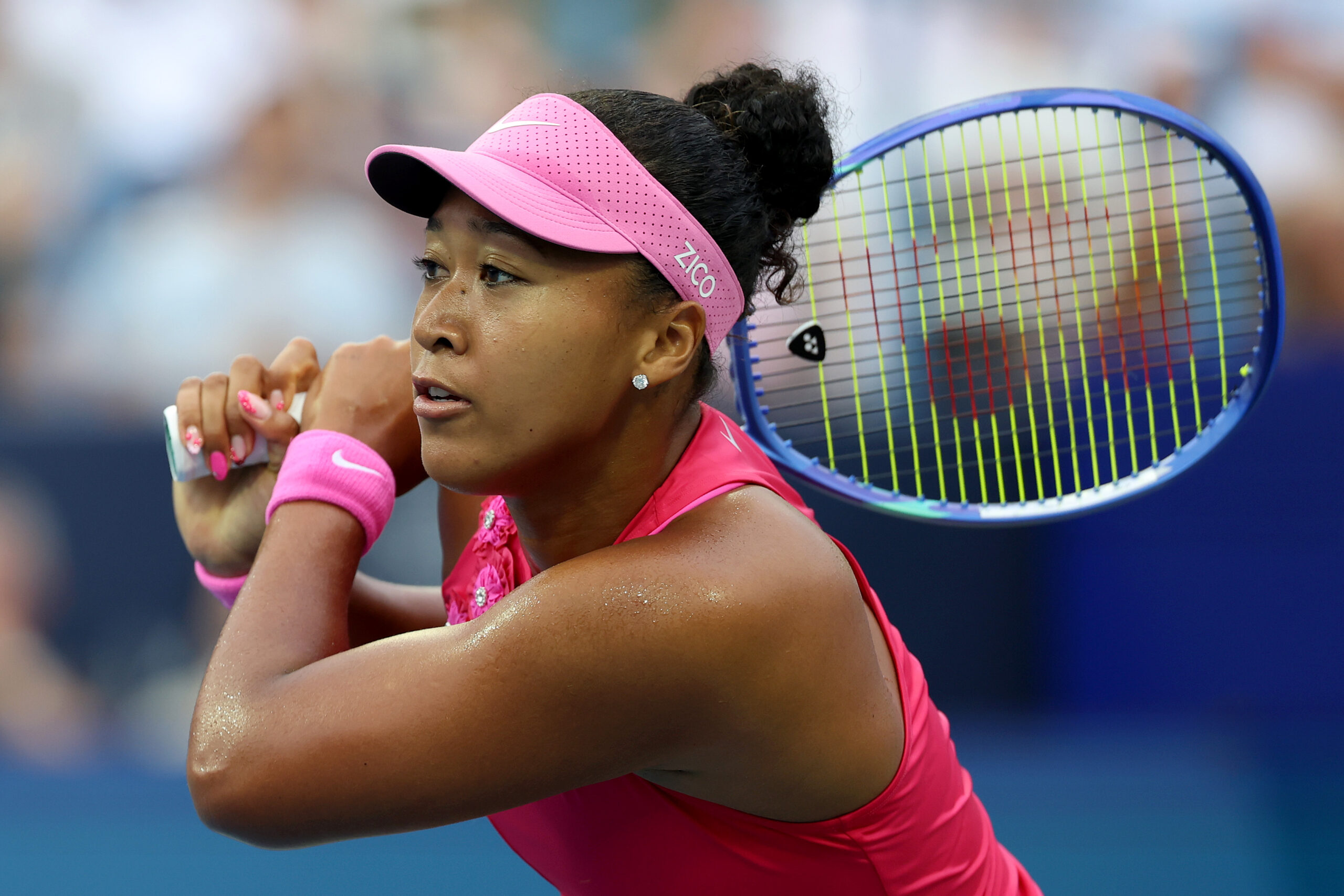 Osaka reaches first Washington quarterfinal as Krueger retires with right ankle injury