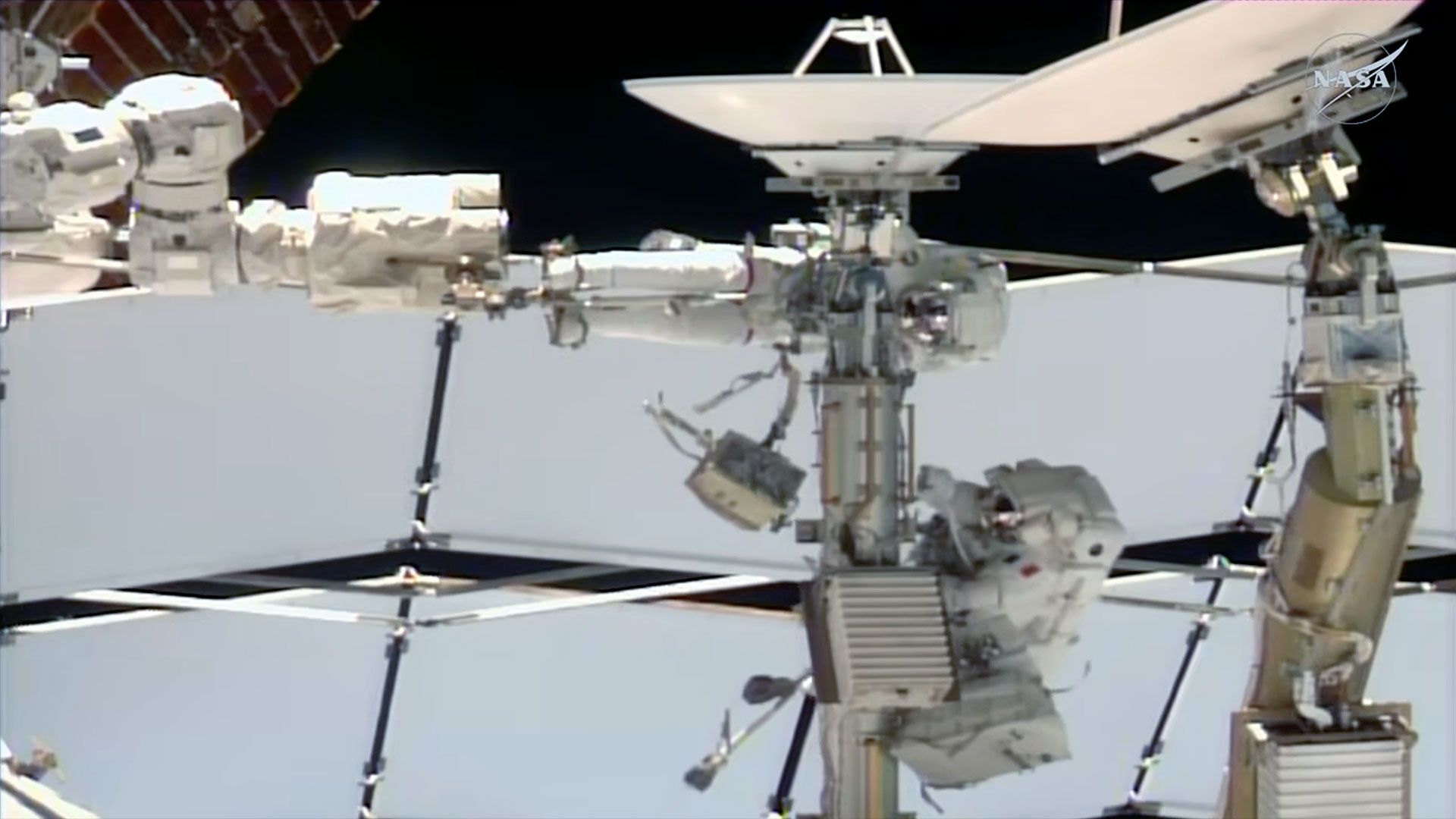 NASA astronaut and 1st female French spacewalker remove failed antenna, but run out of time for replacement