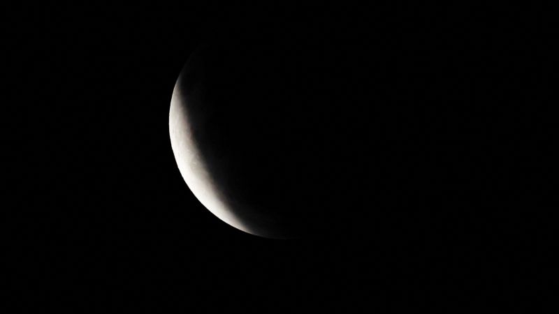 Photos: August’s full moon and partial lunar eclipse
