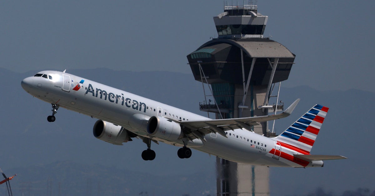 Pilot reports possible burn injuries after passenger's laptop catches fire on American Airlines flight