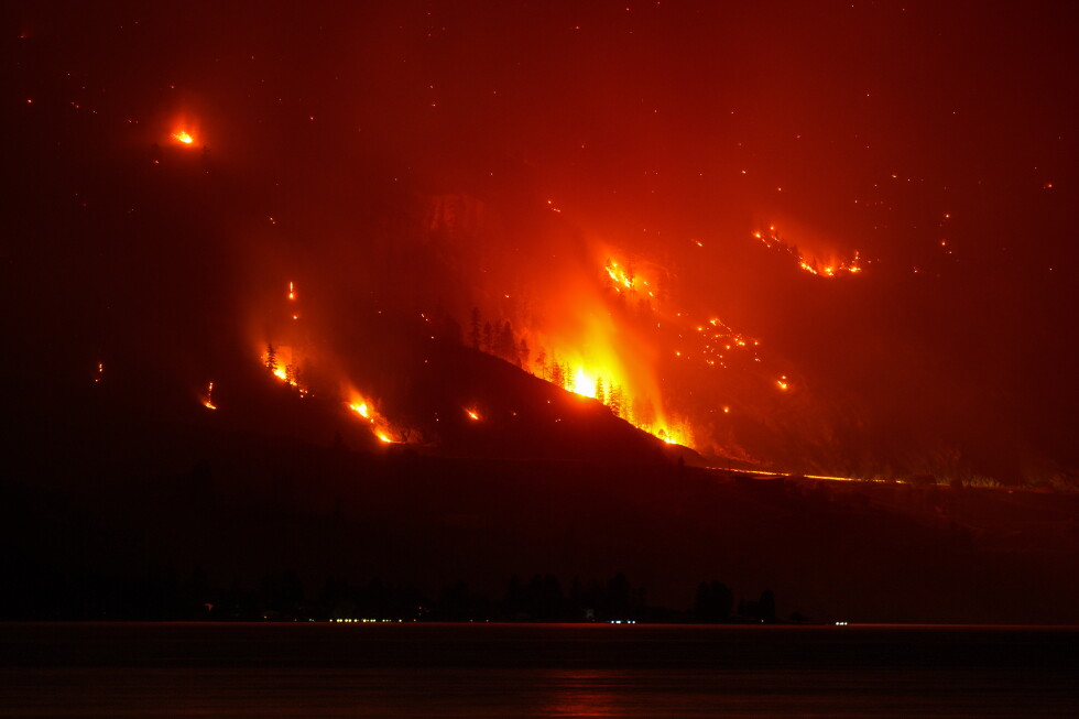Residents evacuate as wildfires burn in western US and Canada