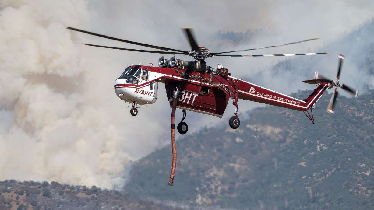 Status of 2 on board firefighting helicopter unknown after crash near Widemouth 2 Fire