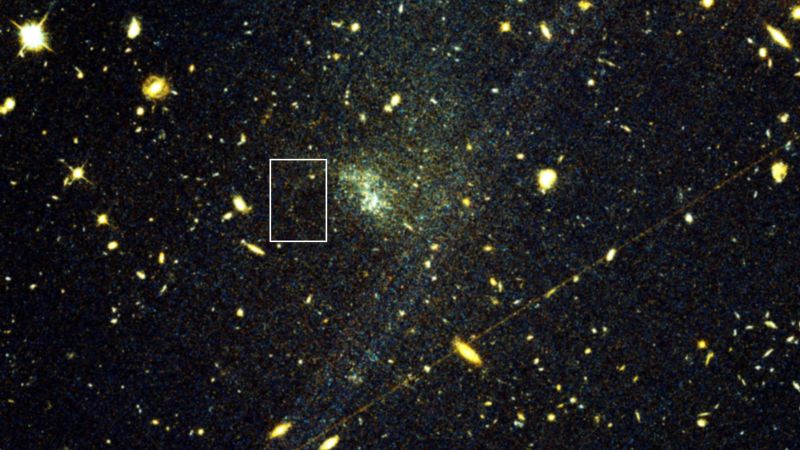 Stellar stream discovery beyond Milky Way helps map dark matter