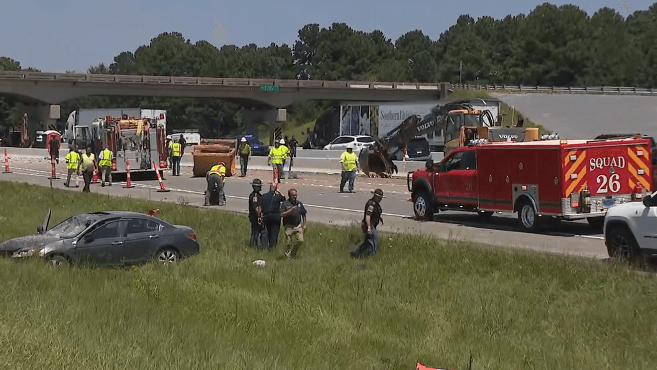 Two Injured After Construction Equipment Strikes Shelby County Overpass, Causing Damage