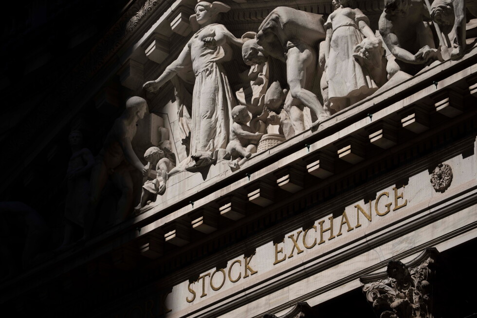 US stocks edge down from their record after oil prices climb 5%