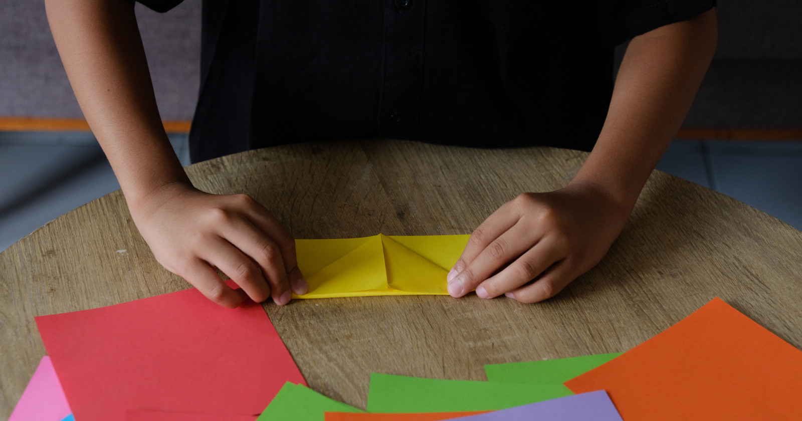 A 14-year-old in New York folded 54 variations of the same origami crease pattern and stacked dumbbells on them to see which collapsed — the winning fold held more than 9,000 times its own weight, the design is aimed at flat-pack disaster shelters, and it took the $25,000 top middle-school prize