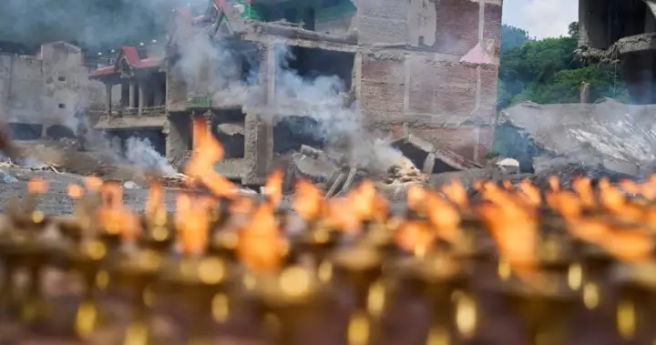 Nepal holds day of mourning after deadly floods kill at least 1,300 - National