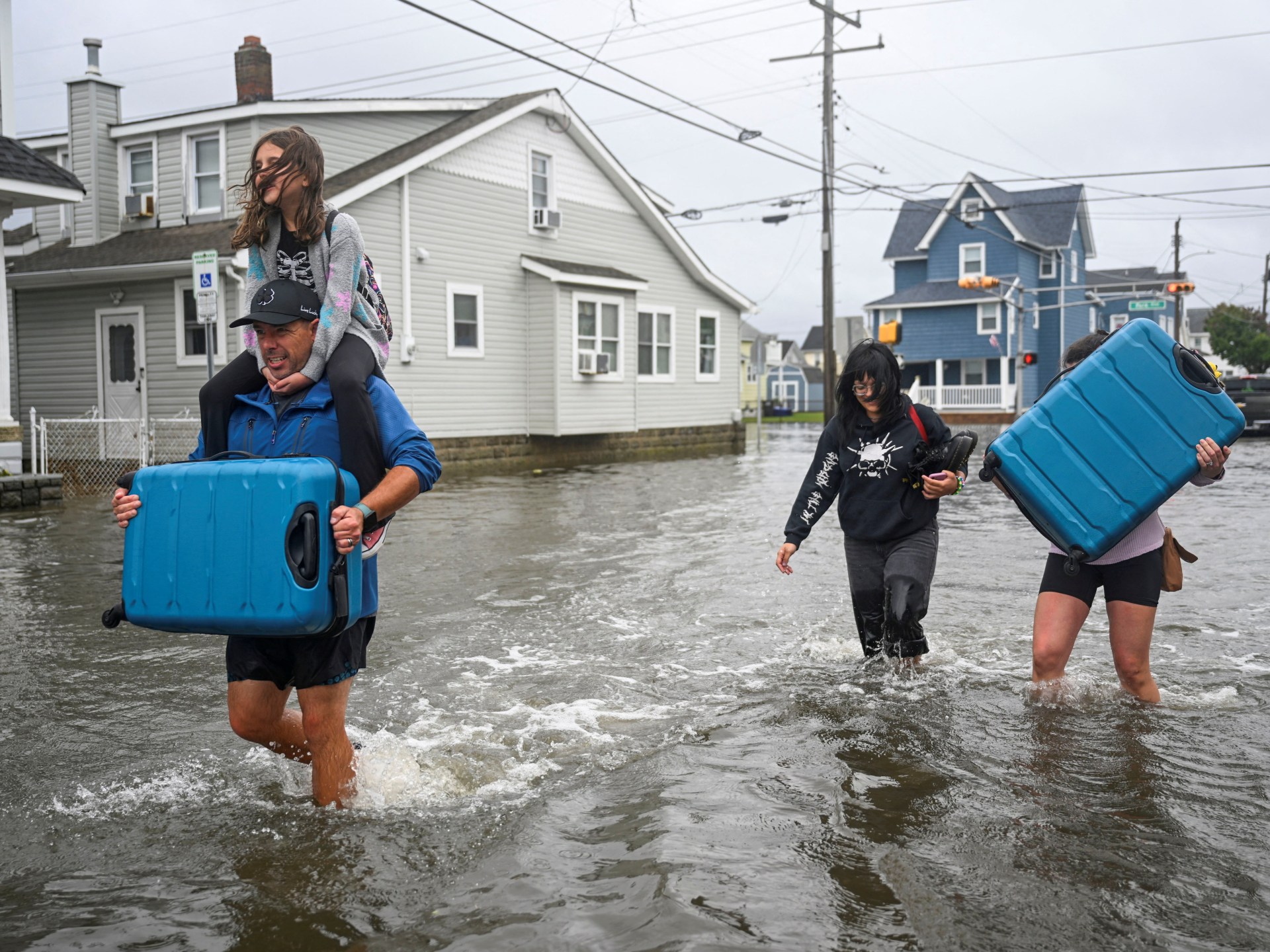 One dead as powerful storm brings flooding, power cuts to northeastern US | Weather News