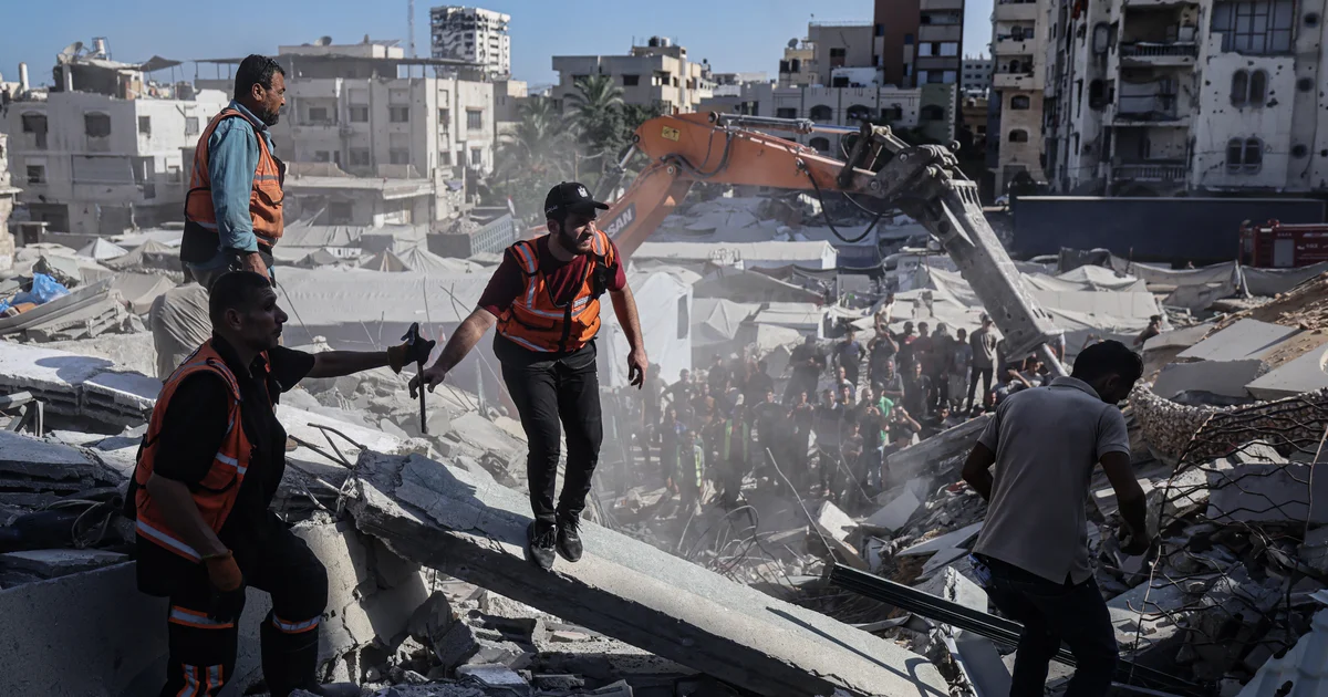 War-damaged Gaza building housing displaced Palestinian families collapses, killing at least 20 people