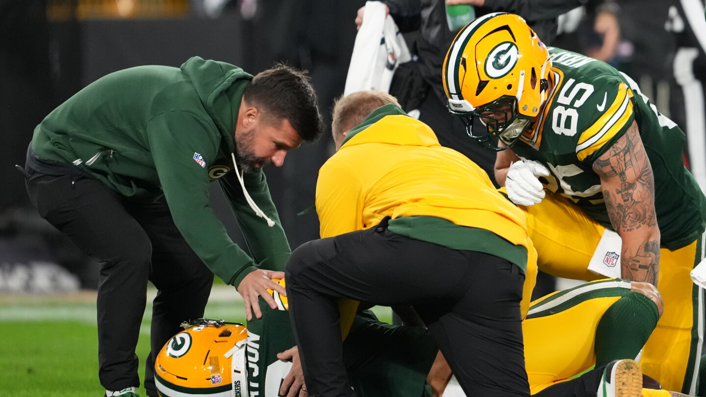Christian Watson cleared, on his way back to Lambeau from hospital