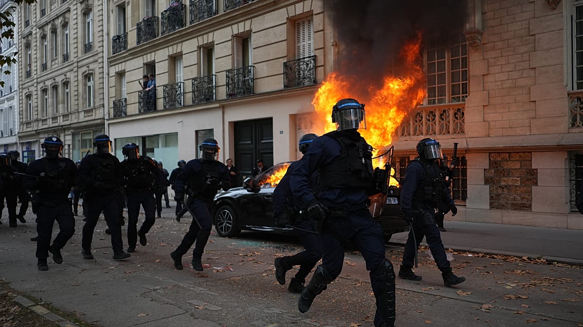 Dozens arrested as protesters clash with security forces in Paris in major day of planned demonstrations