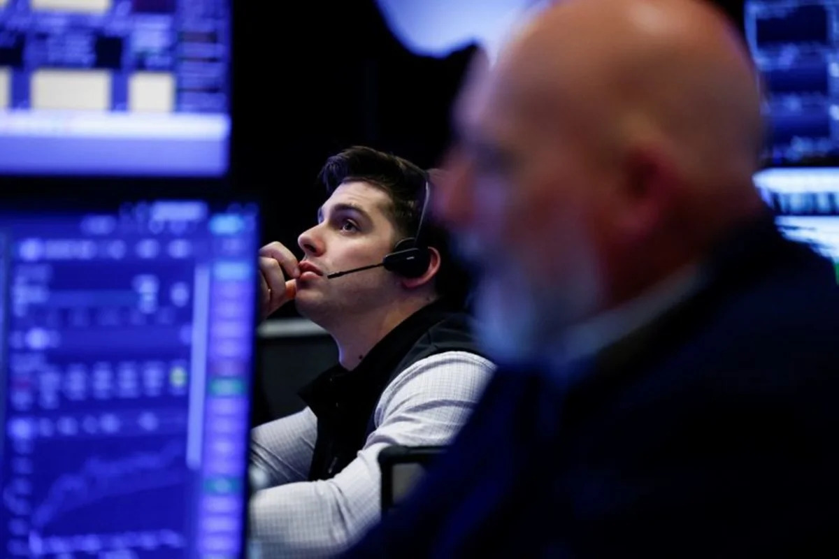 Wall Street ends lower as Alphabet revenue miss revives AI capex jitters